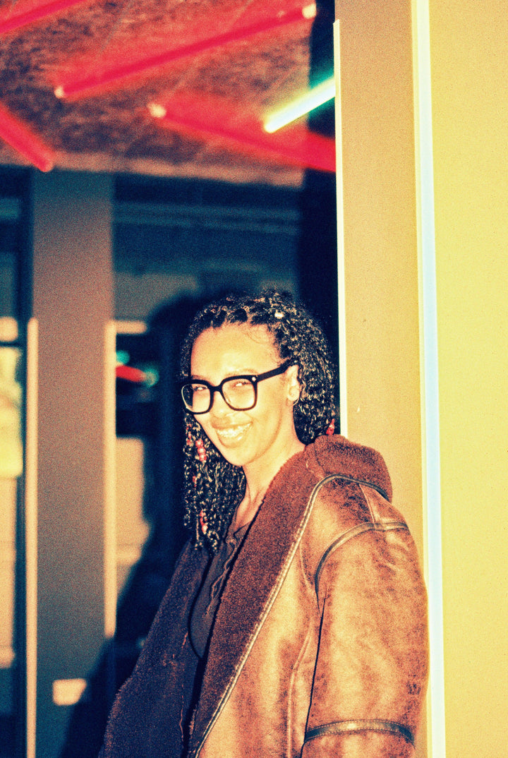 Creative portrait captured on Harman Red 125 film with fine-grain detail