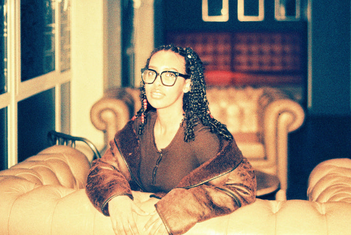 Close-up portrait shot using Harman Red 125 film for analog photography