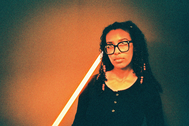 Studio portrait shot using Harman Red 125 35mm film by Ilford Harman