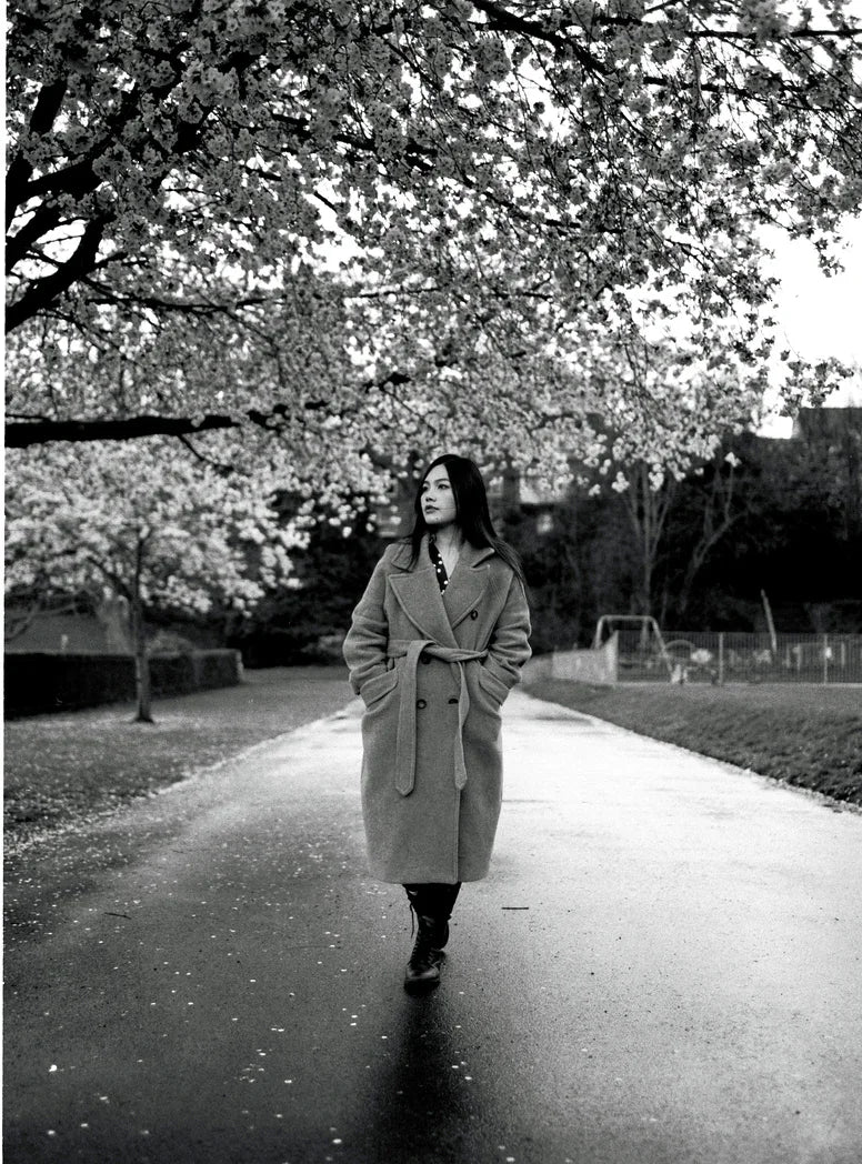 Outdoor portrait captured on HP5 120 roll film highlighting authentic monochrome textures and contrast