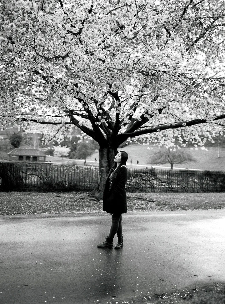 Outdoor portrait taken on Ilford HP5 Plus 400 120 film with natural light and expressive black and white tones