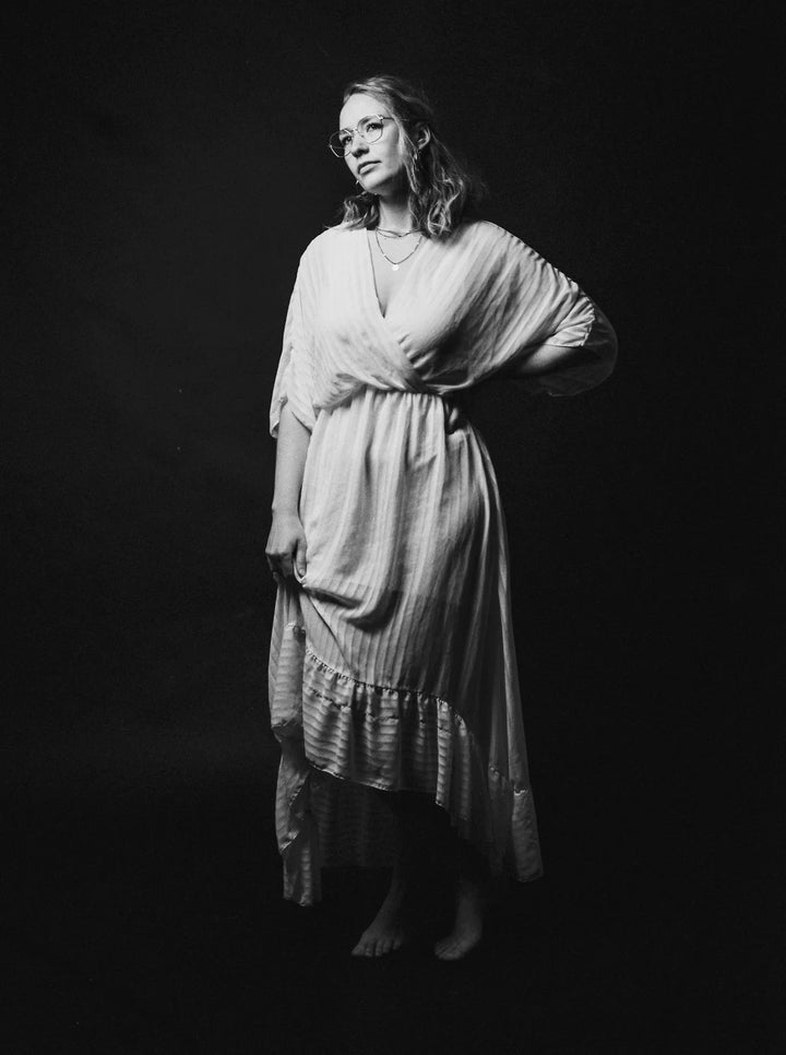 Studio portrait photographed using HP5 120 roll film, showcasing sharp details and rich monochrome contrast