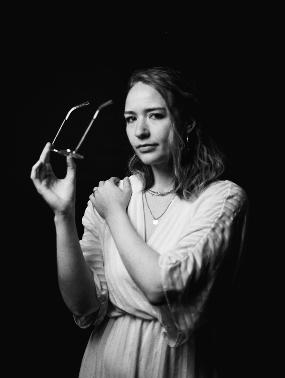 Studio portrait captured on Ilford HP5 Plus 400 120 film with classic black and white tones and fine grain