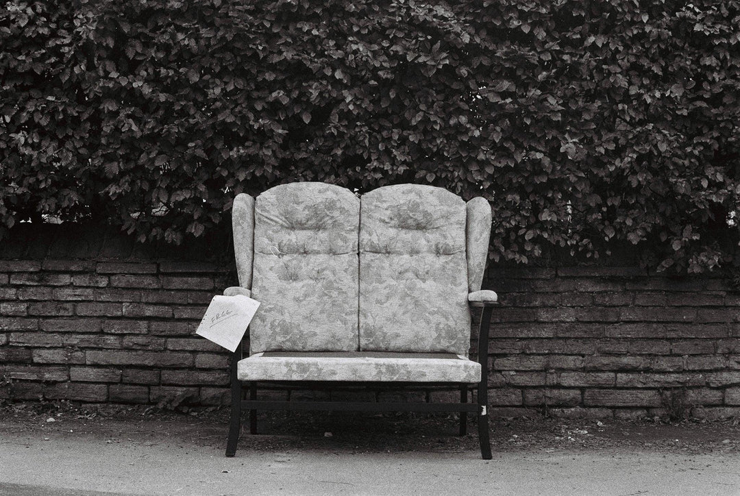 Urban street photography taken with Kentmere Pan 400 35mm film, highlighting rich blacks and smooth greys