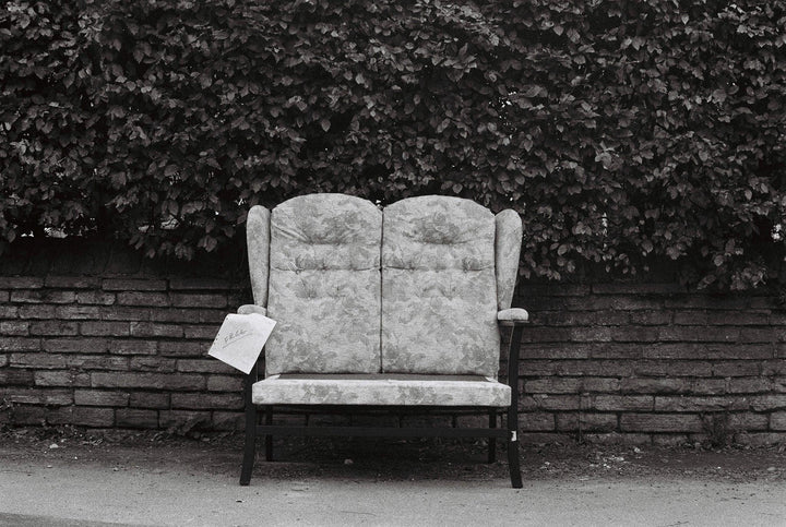 Urban street photography taken with Kentmere Pan 400 35mm film, highlighting rich blacks and smooth greys