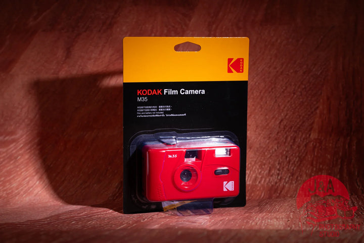 Kodak M35 35mm reusable film camera in red with built-in flash and fixed-focus lens