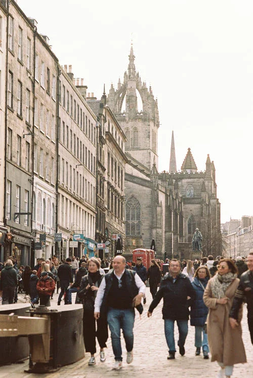 Street view in Cambridge captured on Kodak Portra 160 film, showing natural skin tones, soft colours, and fine grain detail.