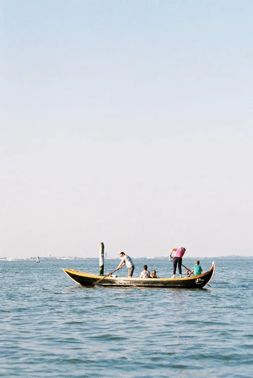 Venice, Italy – Boats on the sea captured on Kodak ProImage 100 35mm film, highlighting natural colours and fine detail.