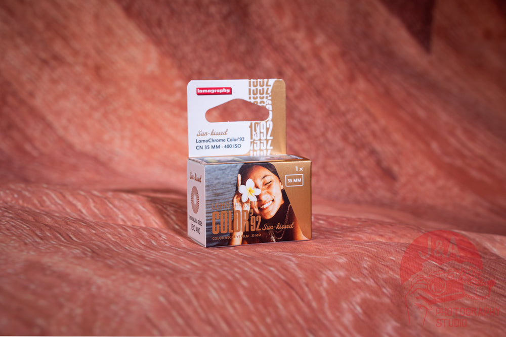 Lomography Lomochrome Sun-Kissed 35mm film roll capturing warm, golden tones for creative Lomo photography