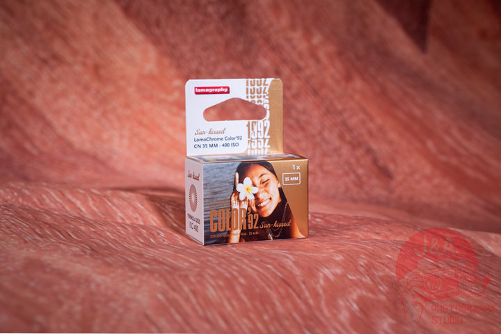 Lomography Lomochrome Sun-Kissed 35mm film roll capturing warm, golden tones for creative Lomo photography