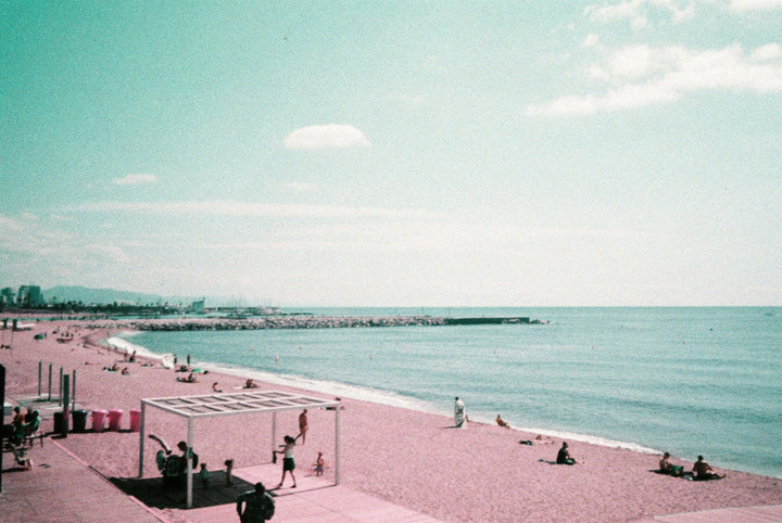 Seaside shot on Lomography Purple 35mm film with vivid purple tones