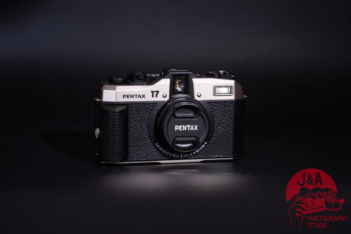 Pentax 17 35mm film camera with half-frame format, seven shooting modes, and zone-focus system, front side