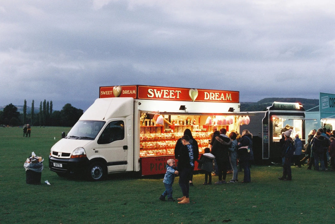 Food selling car at Chatsworth House captured on Cinestill 400D 35mm film with vibrant daylight tones