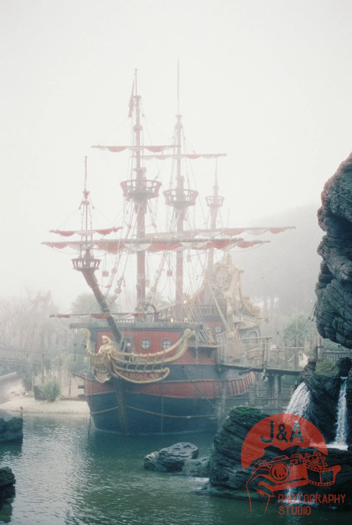 Pirate ship attraction at Disneyland captured on Cinestill 800T 35mm film with vibrant analog colours