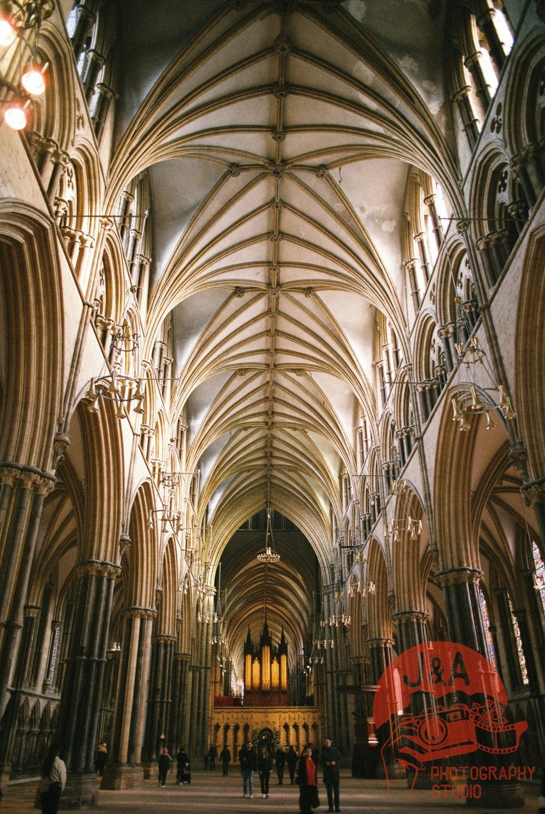 Interior of a church in Lincoln photographed on Fujicolor 400 film, highlighting rich colours, architectural details, and soft tones.