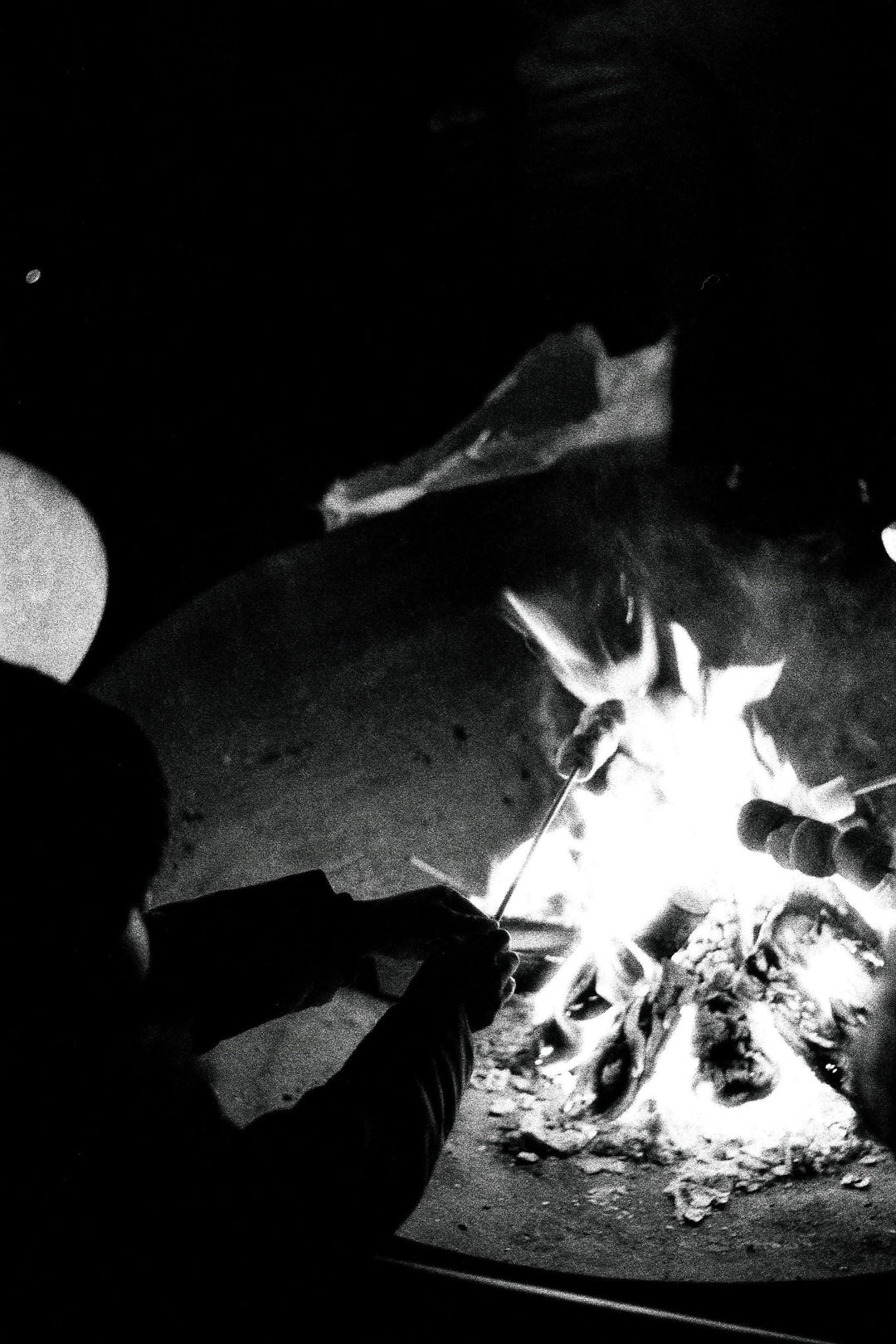 Barbecue meal captured on Ilford Delta 3200 film, showcasing strong textures, natural contrast, and fine monochrome detail.