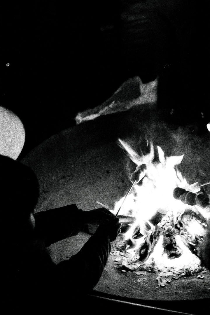Barbecue meal captured on Ilford Delta 3200 film, showcasing strong textures, natural contrast, and fine monochrome detail.