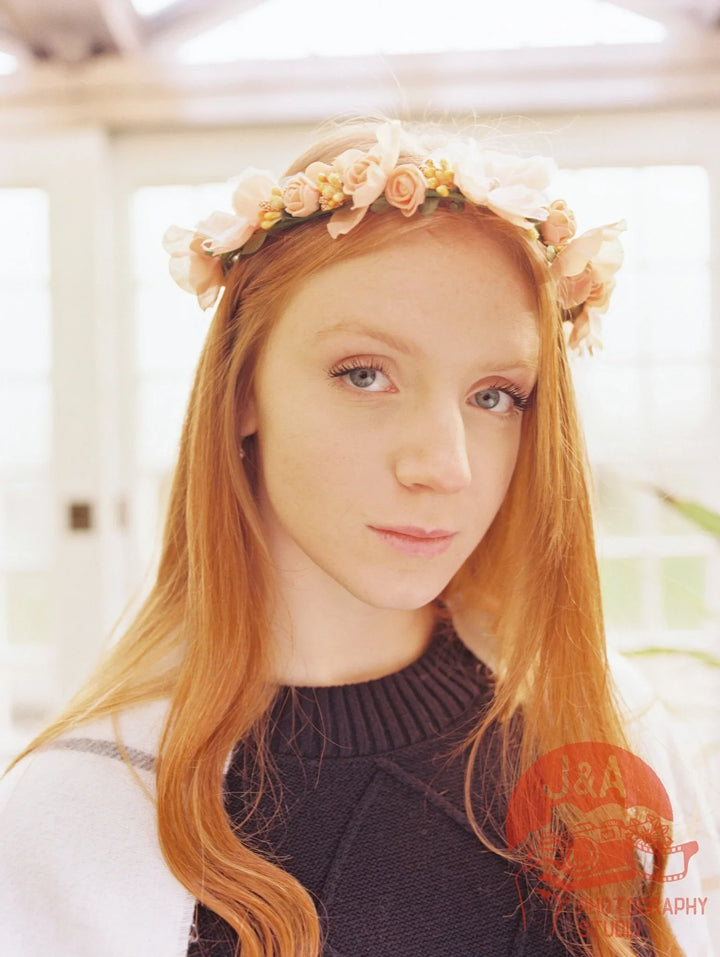 Close-up of a model among flowers in Sheffield Botanical Gardens on Kodak Gold 200 120 film, capturing soft, natural colours and fine detail.